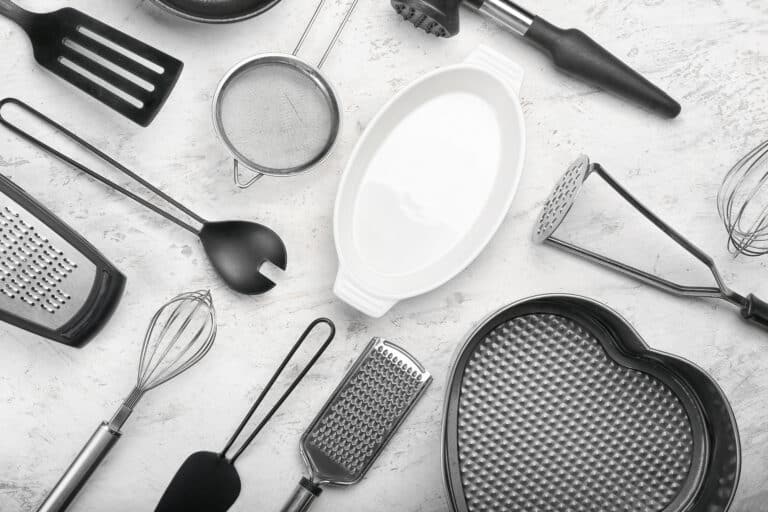 Set of kitchen utensils on light background